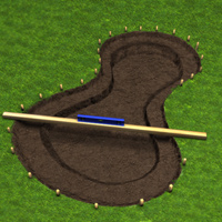 Dig a hole to accomodate the molded water garden