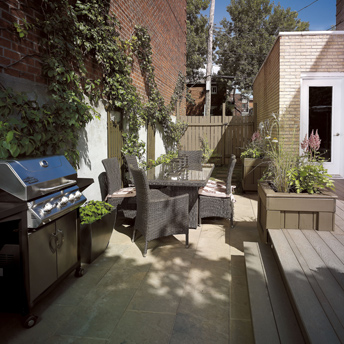 Contemporary outdoor rooms have monotone coordinating colour schemes.