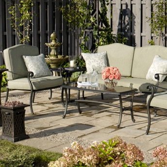 Lay a paver patio with a river-stone border