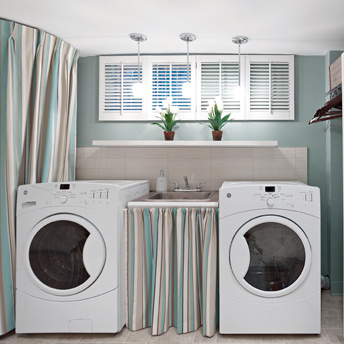 Laundry room with storage and laundry tub