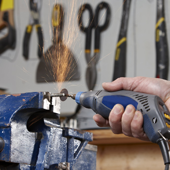 Rotary tool cutting a steel piece