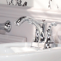 Centre-set faucet with lever handles