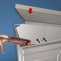 Appliquer un adh&eacute;sif pour fixer le comptoir sur le meuble-lavabo 
