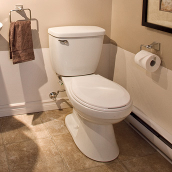 Two-piece toilet in a bathroom