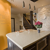 Kitchen with a yellow accent wall
