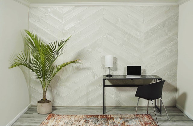 Grey chevron reclaimed barn wood wall