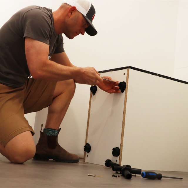 Installation of cabinets feet