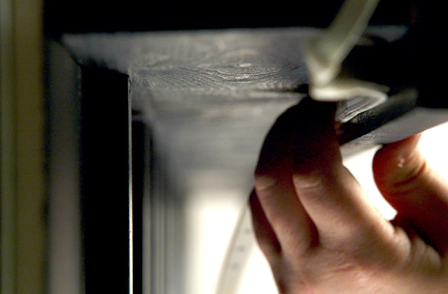 Man installing an LED strip