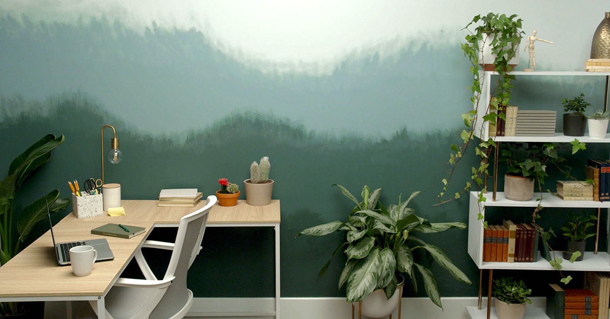 Living room with a forest-inspired ombré mural