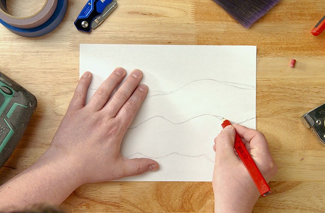 Person drawing a sketch