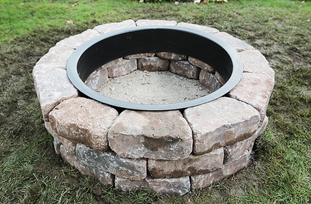 Finalize the patio block fire pit