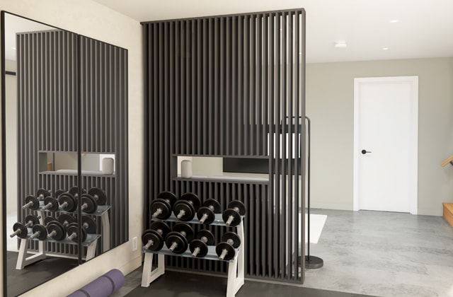 Basement divided by a grey partition wall