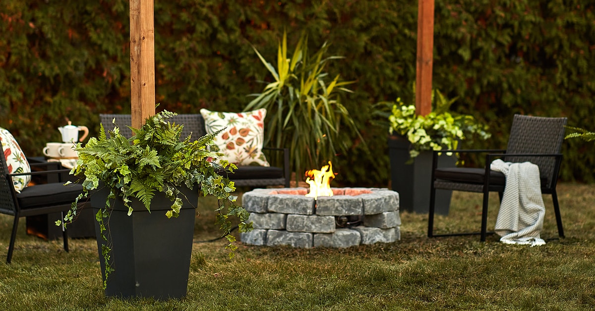 Outdoor entertaining space with a cinder block gas fire pit