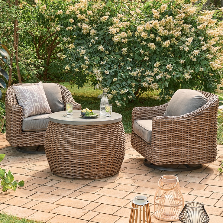 Set of outdoor sofas with a table
