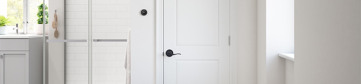 Modern batheroom with a matte black doorknob