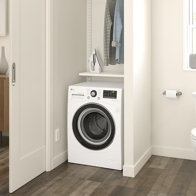 Combined washer and dryer in a modern bathroom