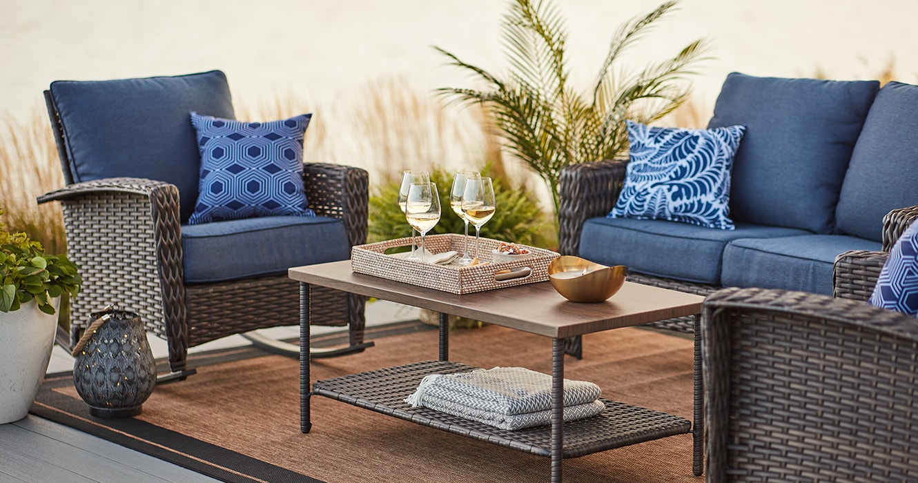Patio set with blue outdoor cushions Patio set with blue outdoor cushions