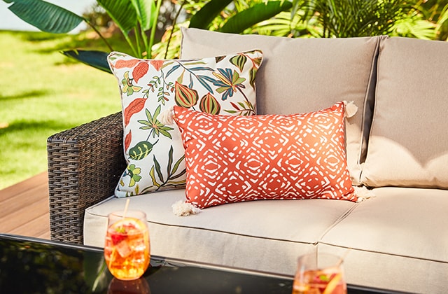 Two outdoor cushions with trendy patterns