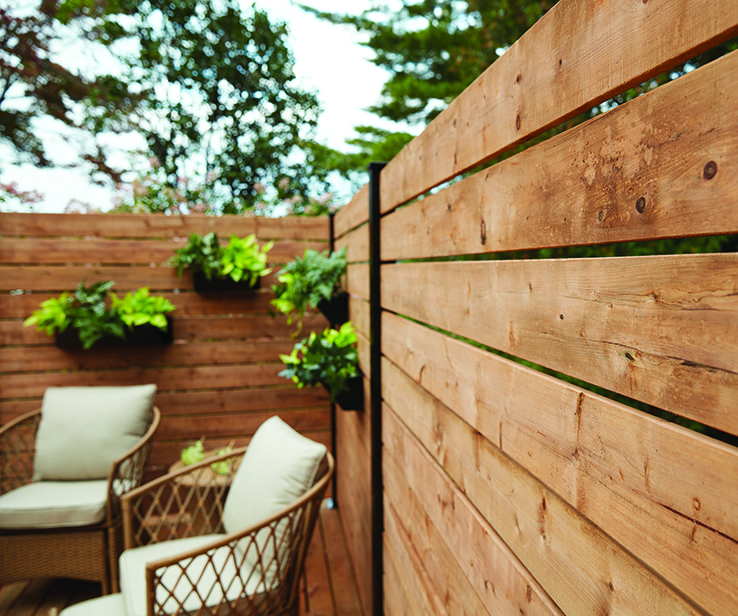 Natural wood privacy fence