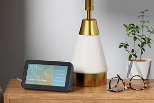 Amazon Echo Show on a bedroom side table