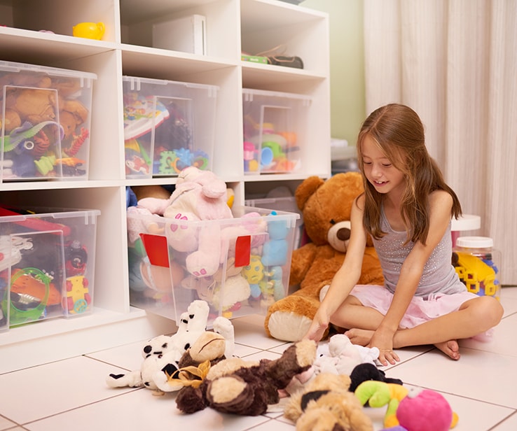 Little girl playing with toys Little girl playing with toys