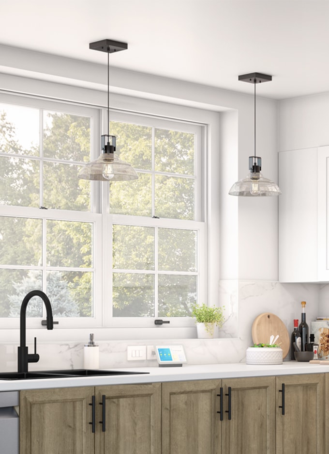 Hanging lights over a kitchen faucet