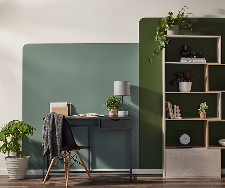 Home office with a green accent wall Home office with a green accent wall