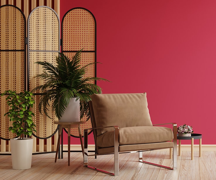 Eclectic living room with a magenta wall