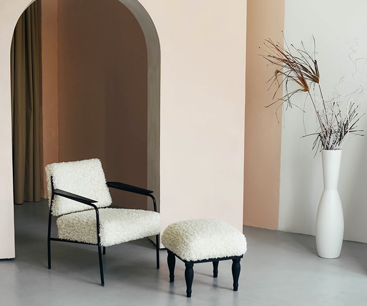 Cozy armchair with an arched doorway