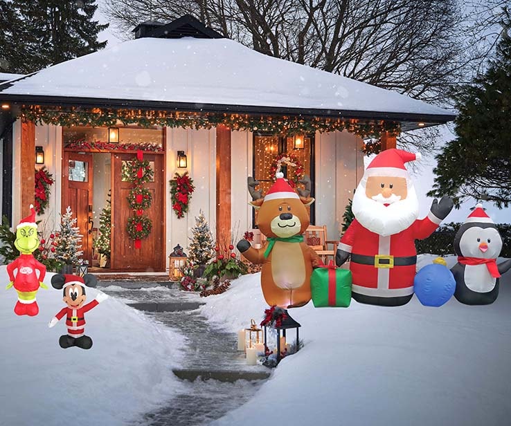 Lawn with several Christmas inflatable decorations