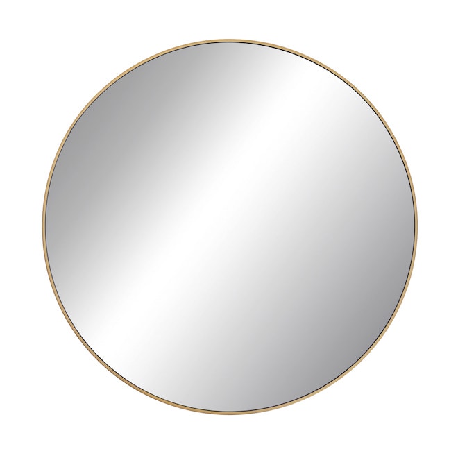 Miroir rond avec contour en laiton
