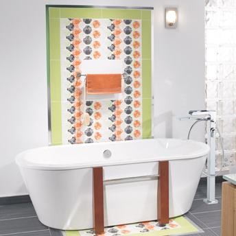 Decorative layout composed of ceramic tiles on the wall behind the bathtub.
