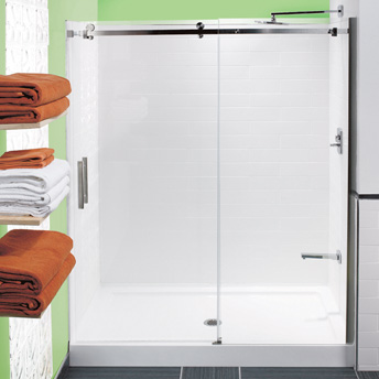 Moulded acrylic panels and glass shower doors can be installed on a preformed shower base.