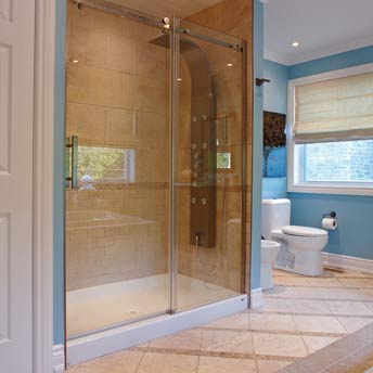 A preformed  shower base can be used with ceramic tile shower walls 